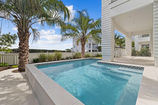 view of pool featuring a patio area