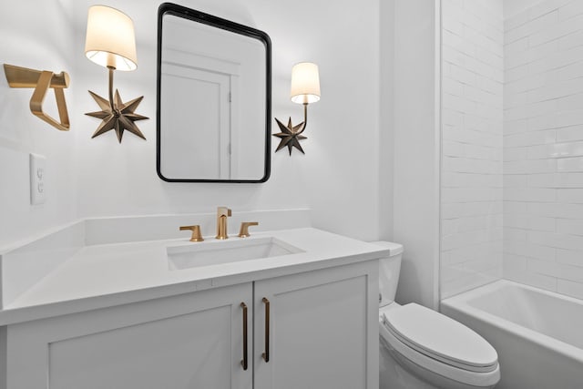 full bathroom with vanity, toilet, and tiled shower / bath