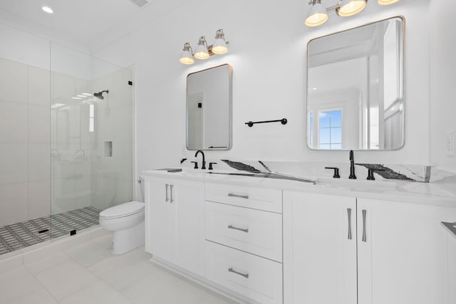 bathroom featuring toilet, an enclosed shower, and vanity