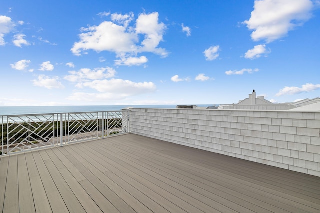 deck featuring a water view