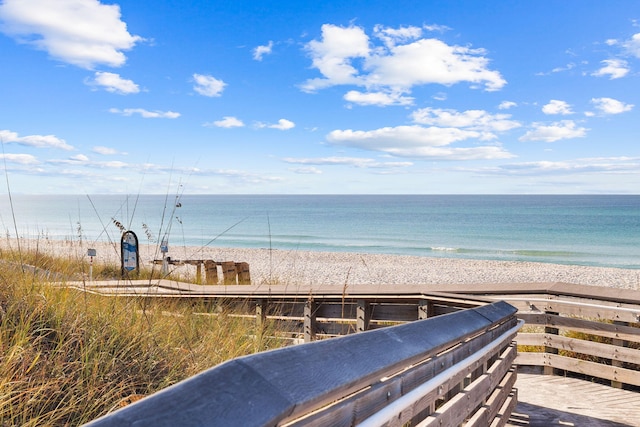 view of water feature with a beach view