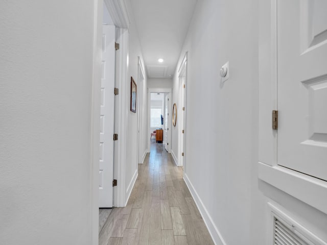 hallway featuring light wood-type flooring