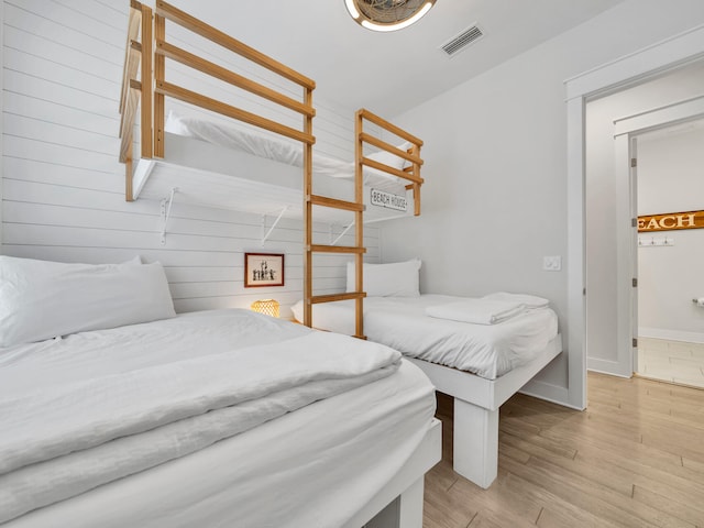 bedroom with light wood-type flooring