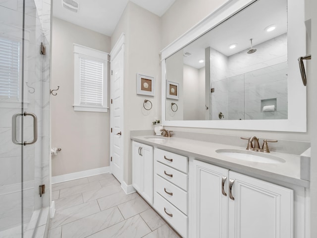 bathroom with vanity and walk in shower