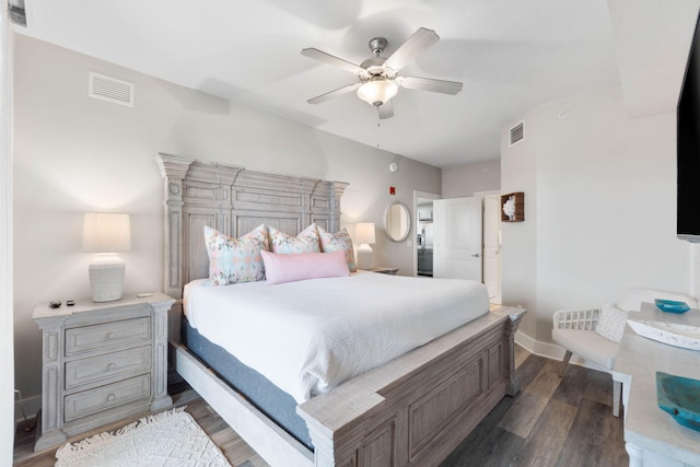 bedroom featuring ceiling fan and dark wood-type flooring