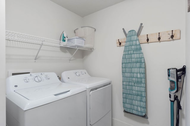 laundry room with washer and dryer