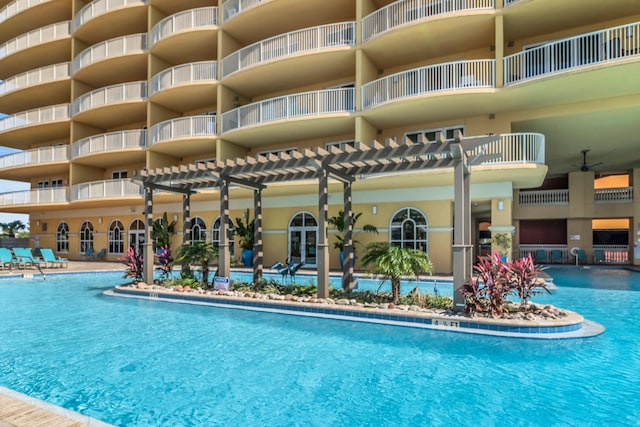 view of swimming pool featuring a pergola