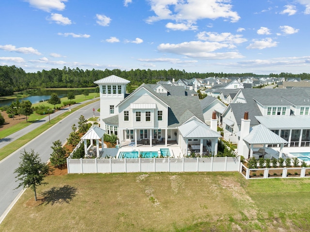 12 Needle Cast Ln, Inlet Beach, FL 32461 - back of house with a gazebo, an outdoor pool, a water view, a patio, and metal roof