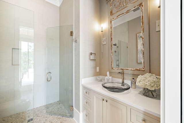 bathroom with vanity and an enclosed shower