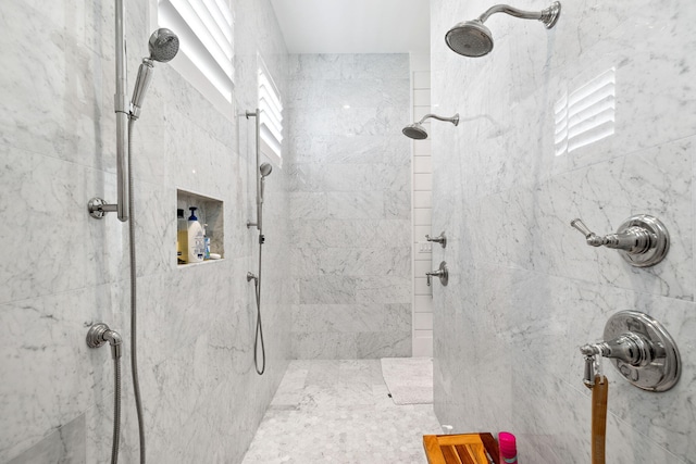 bathroom featuring tiled shower