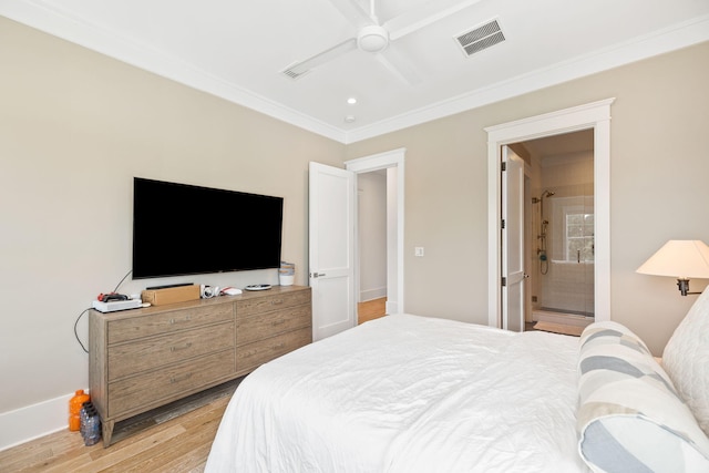 12 Needle Cast Ln, Inlet Beach, FL 32461 - bedroom with light wood-style flooring, crown molding, ceiling fan, and ensuite bathroom