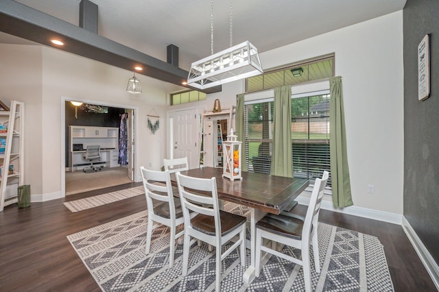 dining room with dark wood-type flooring