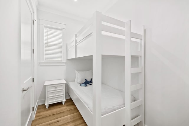 bedroom with light hardwood / wood-style floors