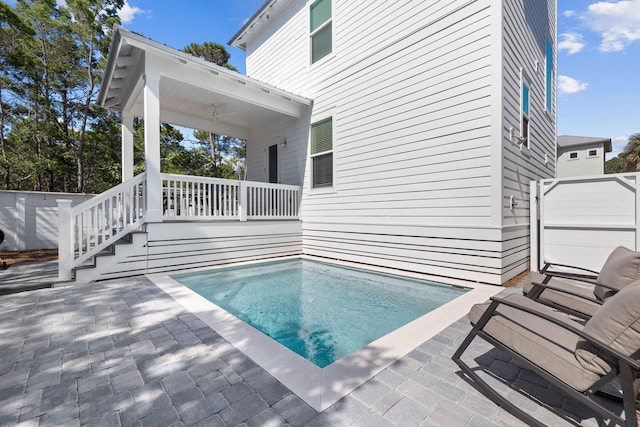 view of pool featuring a patio