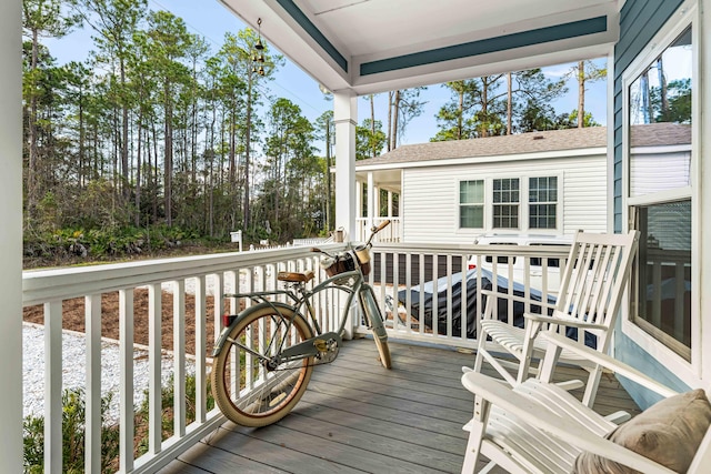 deck with covered porch