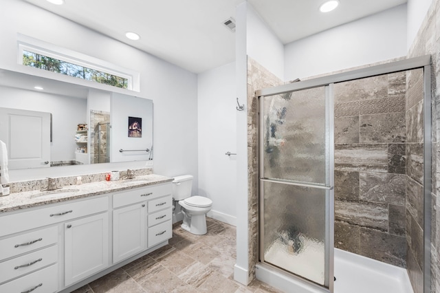 bathroom with toilet, recessed lighting, visible vents, vanity, and a shower stall