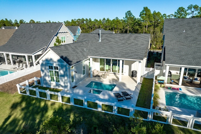 rear view of house with a patio