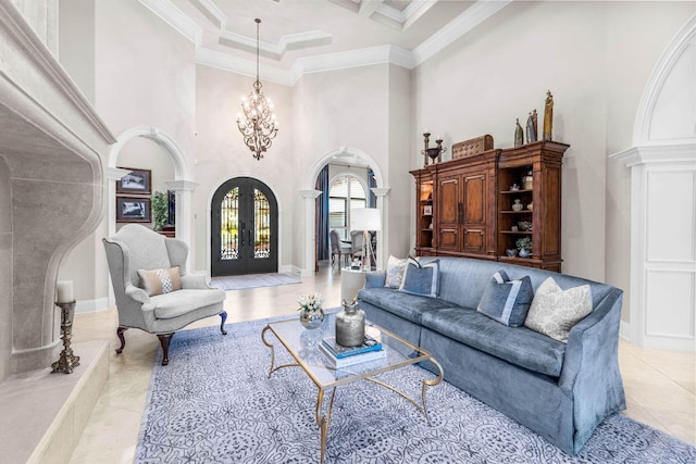 3400 Ravenwood Ln, Miramar Beach, FL 32550 - living room featuring arched walkways, french doors, a high ceiling, a chandelier, and crown molding