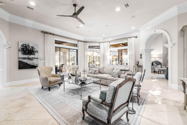 3400 Ravenwood Ln, Miramar Beach, FL 32550 - living room with decorative columns, ceiling fan, crown molding, arched walkways, and light tile patterned floors
