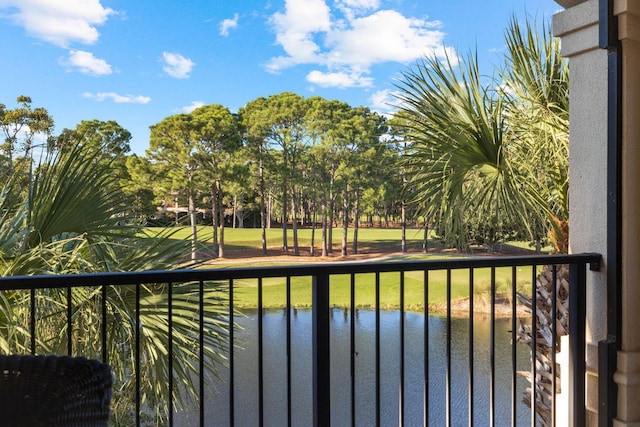 balcony featuring a water view