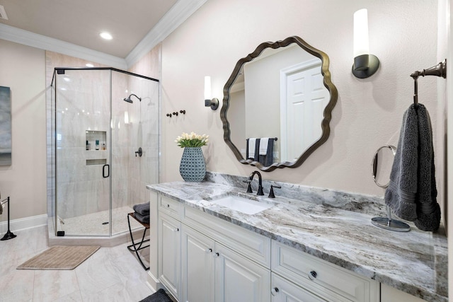 3400 Ravenwood Ln, Miramar Beach, FL 32550 - full bathroom featuring ornamental molding, vanity, a stall shower, marble finish floors, and baseboards