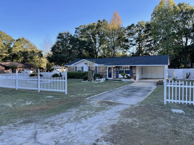 ranch-style house featuring a carport and a front yard