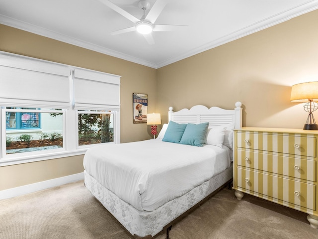 bedroom featuring carpet floors, ceiling fan, and ornamental molding