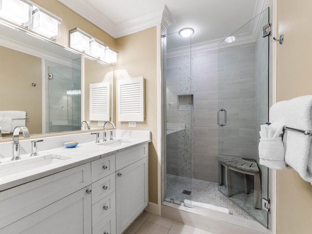 bathroom featuring vanity, tile patterned floors, walk in shower, and crown molding