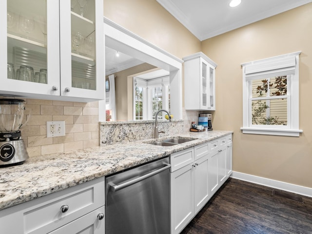 kitchen with dishwasher, dark hardwood / wood-style floors, white cabinetry, and sink