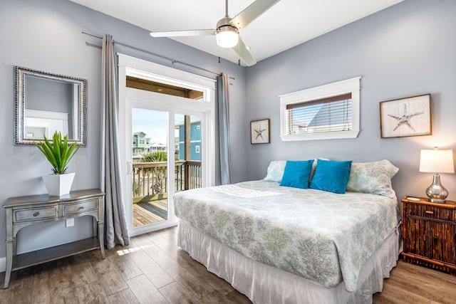 bedroom with ceiling fan, access to exterior, and hardwood / wood-style flooring