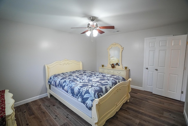 bedroom featuring ceiling fan and dark hardwood / wood-style flooring