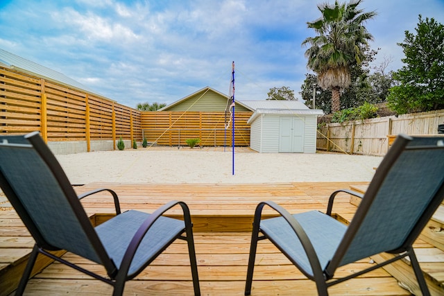 deck featuring a shed