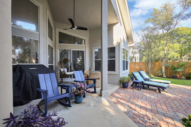 view of patio / terrace featuring ceiling fan and grilling area