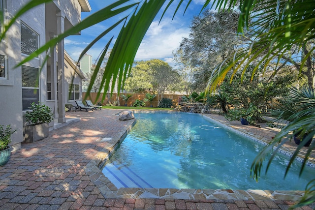 view of pool featuring a patio