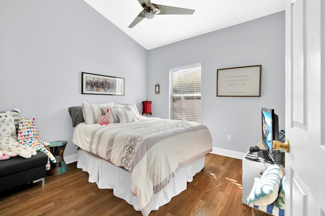 bedroom with vaulted ceiling, ceiling fan, and dark hardwood / wood-style floors