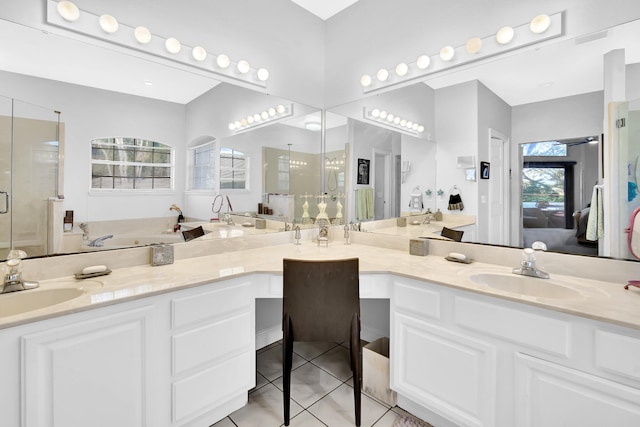 bathroom featuring tile patterned flooring, vanity, plenty of natural light, and independent shower and bath