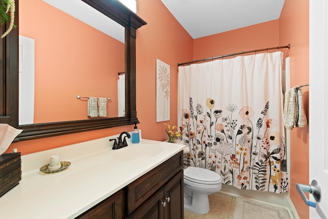 bathroom featuring vanity, tile patterned floors, toilet, a textured ceiling, and curtained shower