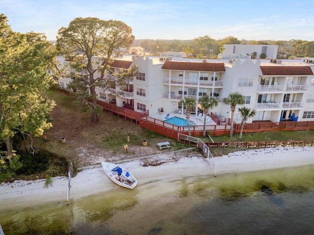 aerial view featuring a view of the beach and a water view