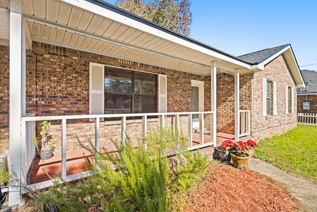 view of property exterior featuring covered porch