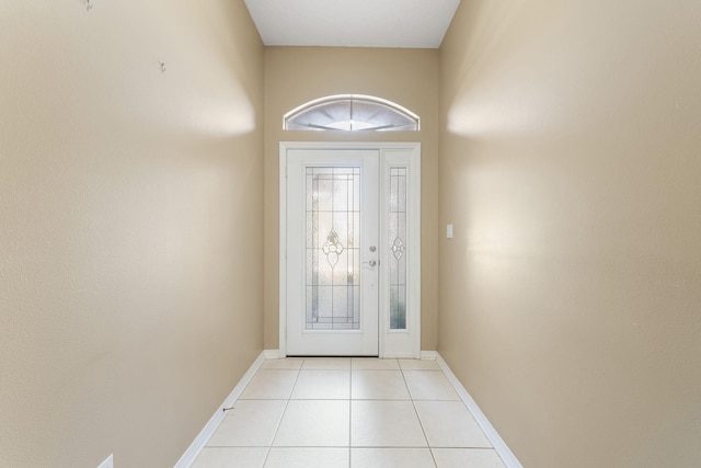 entryway featuring light tile patterned floors