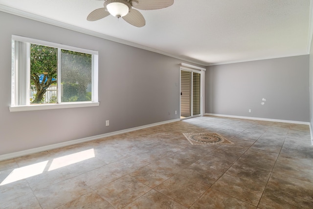 unfurnished room featuring ceiling fan and crown molding