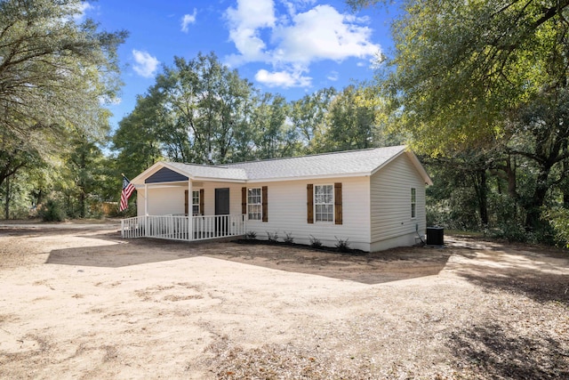 view of front facade with central AC unit and covered porch