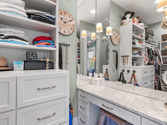 11 Acorn Way, Santa Rosa Beach, FL 32459 - bathroom with vanity and a walk in closet