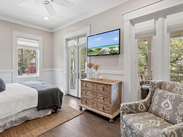 11 Acorn Way, Santa Rosa Beach, FL 32459 - bedroom featuring access to outside, a wainscoted wall, multiple windows, crown molding, and dark wood-style floors