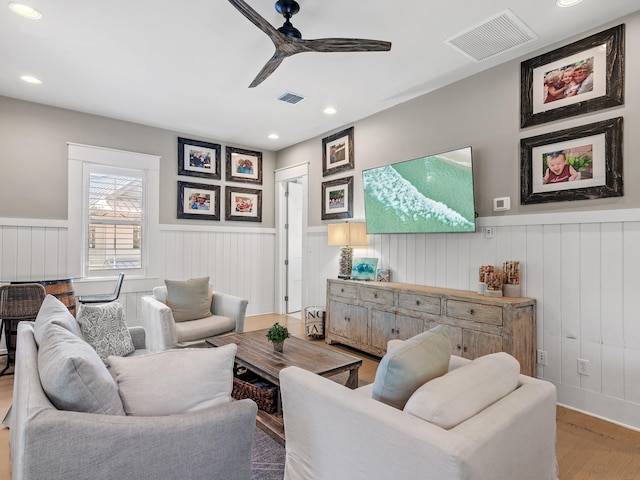 11 Acorn Way, Santa Rosa Beach, FL 32459 - living room featuring a wainscoted wall, a ceiling fan, wood finished floors, and recessed lighting