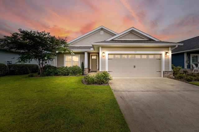 727 Marquis Way, Freeport, FL 32439 - view of front of house featuring a front yard, concrete driveway, and a garage