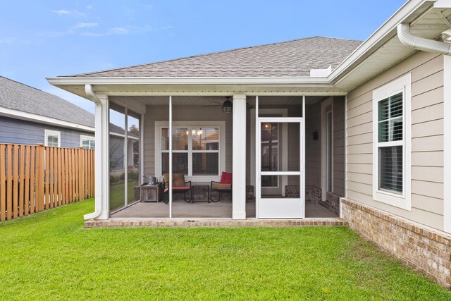 727 Marquis Way, Freeport, FL 32439 - rear view of house with a sunroom, roof with shingles, a patio area, and ceiling fan