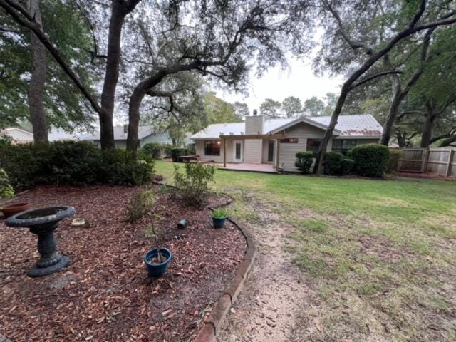 view of yard with fence