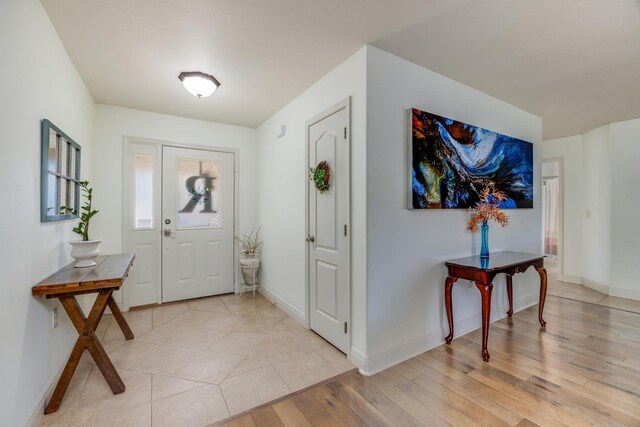 foyer entrance featuring light hardwood / wood-style floors