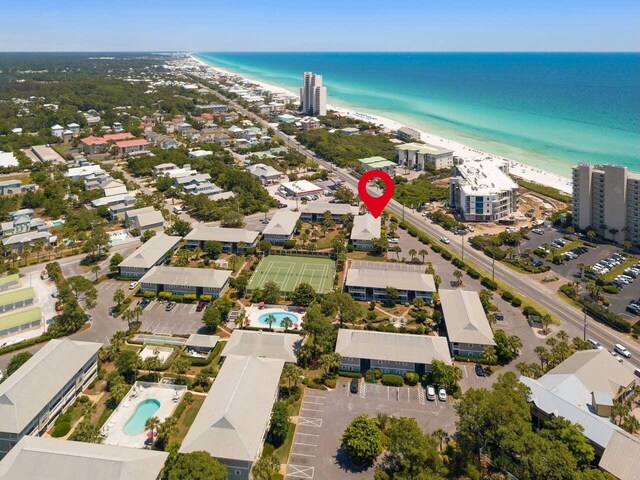 aerial view with a beach view and a water view